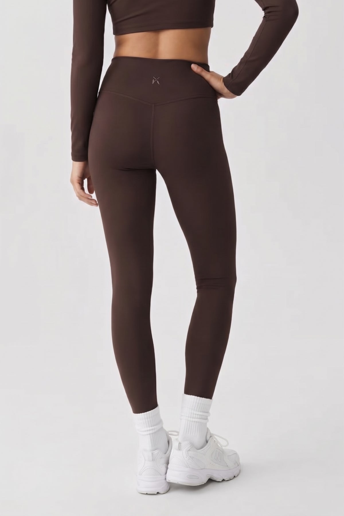 The Execution high-waist gym legging worn for weightlifting and strength training